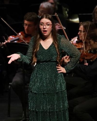 Shannon Engel performs a solo during a music production. 